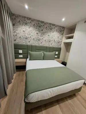 Cama o camas de una habitación en Hostal San Blas