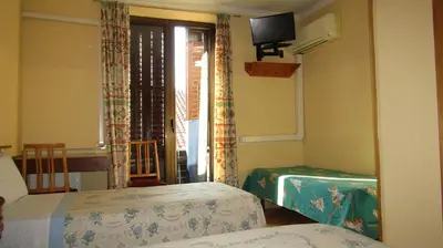 Cama o camas de una habitación en Pensión Mollo