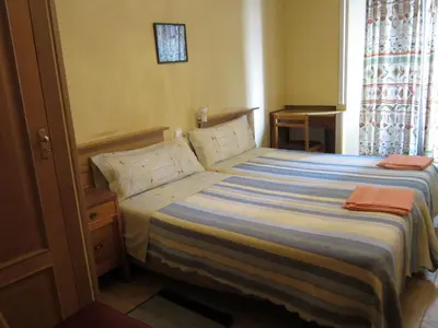 Cama o camas de una habitación en Pensión Mollo