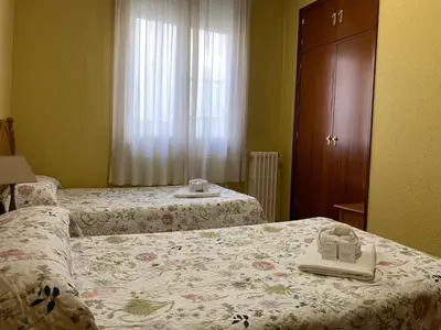 Cama o camas de una habitación en Hostal Internacional