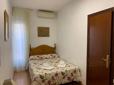 Cama o camas de una habitación en Hostal Internacional