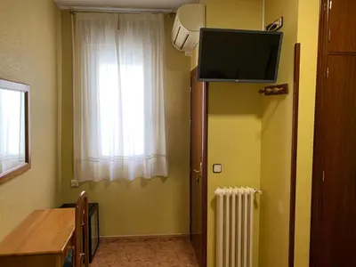Una televisión o centro de entretenimiento en Hostal Internacional