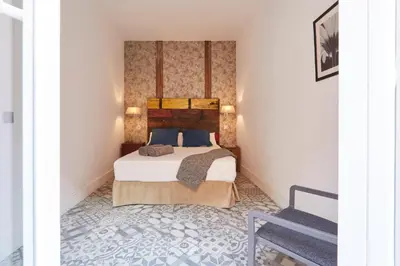 Cama o camas de una habitación en LEEWAYS APARTMENT in FE