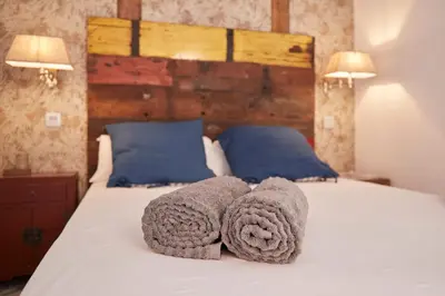 Cama o camas de una habitación en LEEWAYS APARTMENT in FE