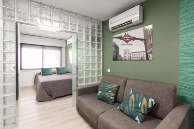 Zona de estar de Callao Apartment
