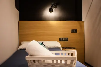 Cama o camas de una habitación en CC Malasaña