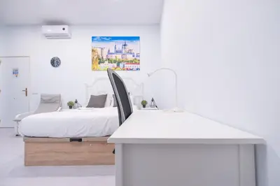 Cama o camas de una habitación en ABC Apartments Madrid