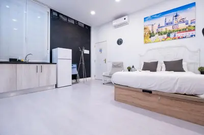 Cama o camas de una habitación en ABC Apartments Madrid