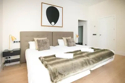 Cama o camas de una habitación en Bright Luxury apt. Puerta del Sol - Madrid