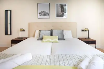Cama o camas de una habitación en Bright Luxury apt. Puerta del Sol - Madrid