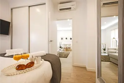 Cama o camas de una habitación en Sofia Suites