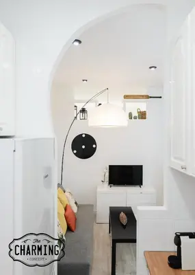 Una televisión o centro de entretenimiento en Atocha - Apartamento de 2 dormitorios en el Centro de Madrid