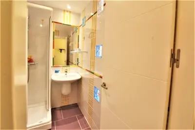 Un baño de Hostal Arco Iris
