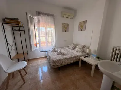 Cama o camas de una habitación en Hostal Arrate