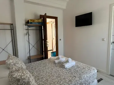 Cama o camas de una habitación en Hostal Arrate