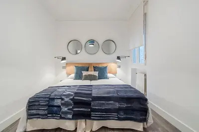 Cama o camas de una habitación en Zurbano Madrid - Apartamento Elegante y Confortable en el Centro