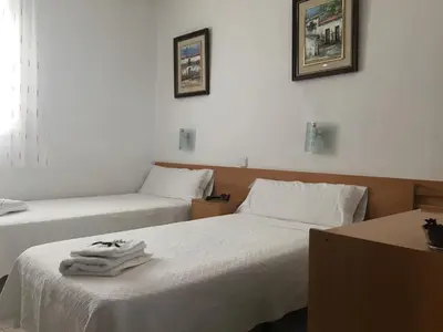Cama o camas de una habitación en Hostal R. Lido