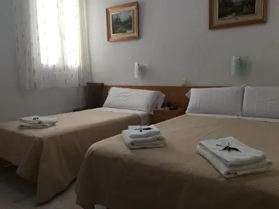 Cama o camas de una habitación en Hostal R. Lido