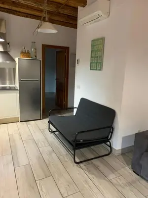 Una cocina o zona de cocina en Gran Vía apartamentos de temporada