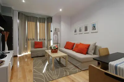 Zona de estar de Apartamentos Adelfas