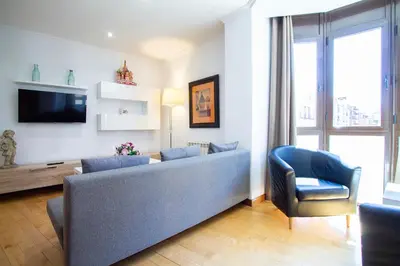 Zona de estar de Apartamentos Adelfas