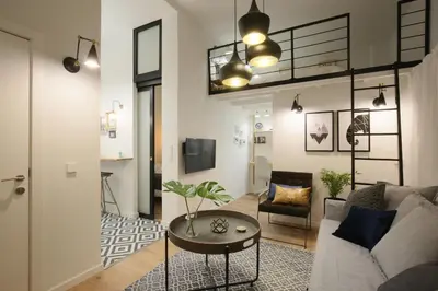 Zona de estar de Moderno y reformado apartamento al lado del Museo