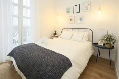 Cama o camas de una habitación en Moderno y reformado apartamento al lado del Museo