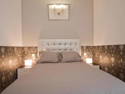 Cama o camas de una habitación en Deluxe en plaza mayor