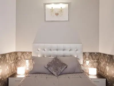 Cama o camas de una habitación en Deluxe en plaza mayor