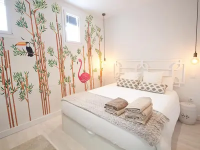 Cama o camas de una habitación en Un perfecto refugio en el centro de madrid