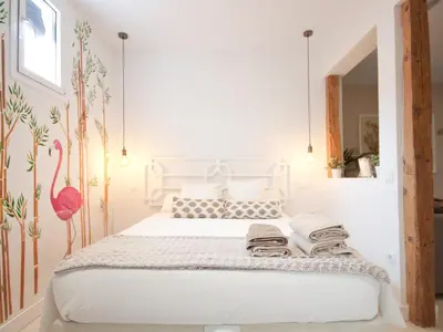 Cama o camas de una habitación en Un perfecto refugio en el centro de madrid