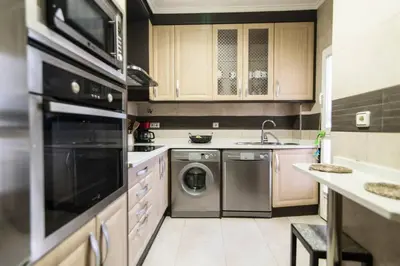 Una cocina o zona de cocina en Home & Private Terrace WIFI + AIRCON