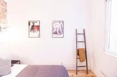 Cama o camas de una habitación en INTIMATE AND ARTISTIC FLAT WIFI PUERTA DEL SOL