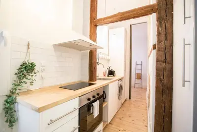 Una cocina o zona de cocina en INTIMATE AND ARTISTIC FLAT WIFI PUERTA DEL SOL