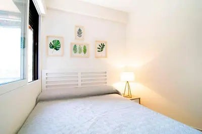 Cama o camas de una habitación en Beautiful Apartment next to Santiago Bernabeu by Batuecas