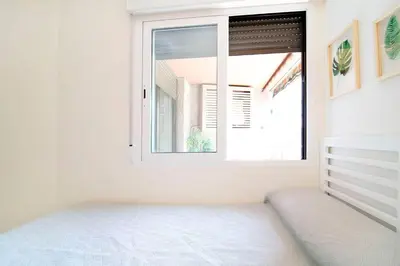 Cama o camas de una habitación en Beautiful Apartment next to Santiago Bernabeu by Batuecas