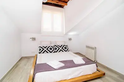 Cama o camas de una habitación en Madrid Center apartment next Plaza Mayor by Batuecas
