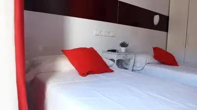 Cama o camas de una habitación en CH Antonio