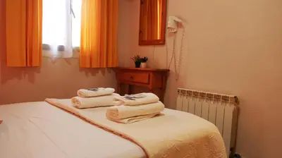 Cama o camas de una habitación en CH Antonio