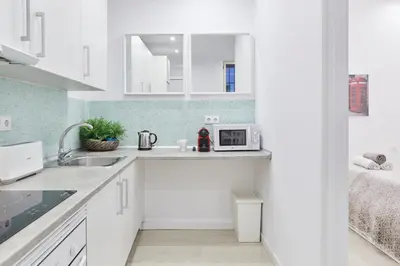 Una cocina o zona de cocina en LEEWAYS APARTMENT in DIVINO PASTOR