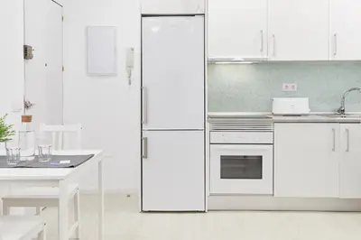 Una cocina o zona de cocina en LEEWAYS APARTMENT in DIVINO PASTOR