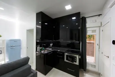 Una cocina o zona de cocina en Wind Rose 7 - reformado Julio 2024