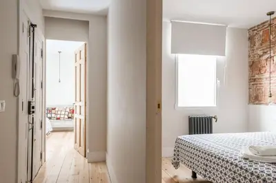 Cama o camas de una habitación en Impressive Apartment in Madrid Center by Batuecas