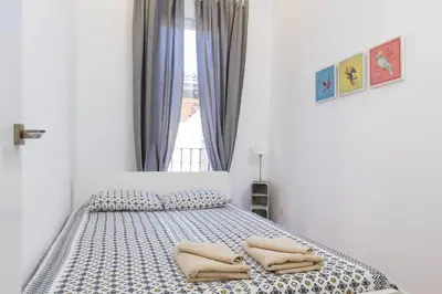 Cama o camas de una habitación en Marvelous Apartment of 3 Bedrooms near La Latina by Batuecas