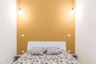 Cama o camas de una habitación en Marvelous Apartment of 3 Bedrooms near La Latina by Batuecas