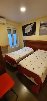 Cama o camas de una habitación en Hostal Moncloa