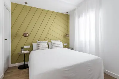 Cama o camas de una habitación en Style Apartments by Olala Homes