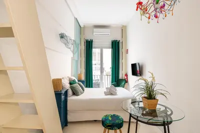 Cama o camas de una habitación en Waou Gran Via III - Alquiler Corta Duración