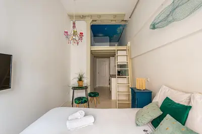Cama o camas de una habitación en Waou Gran Via III - Alquiler Corta Duración