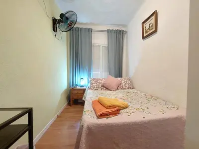 Cama o camas de una habitación en HomeStay Olivos